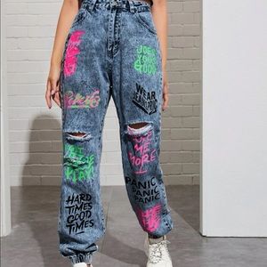 High waisted slogan graphic ripped detail Jeans